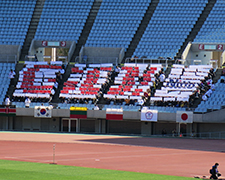 Human letters at the stadium